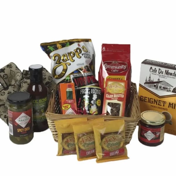 Gift basket with assorted snacks and coffee products in a wicker basket