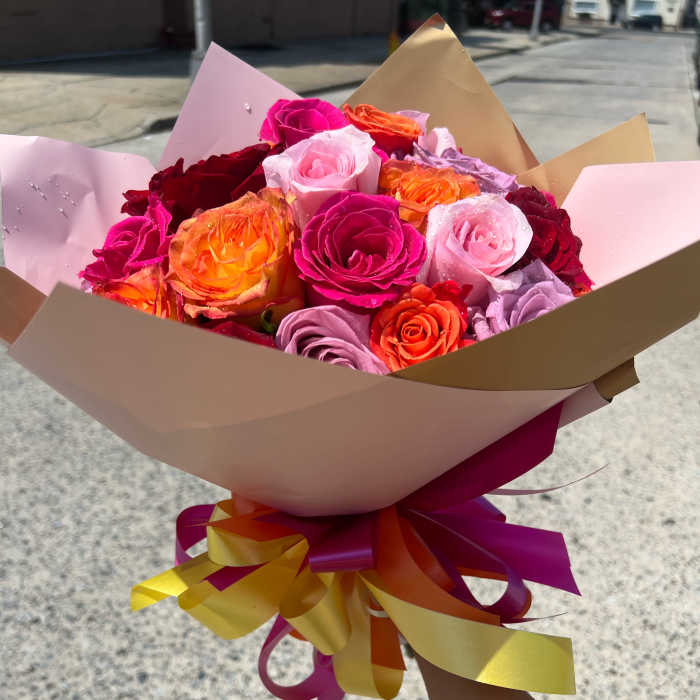 Two dozen of colorful Roses