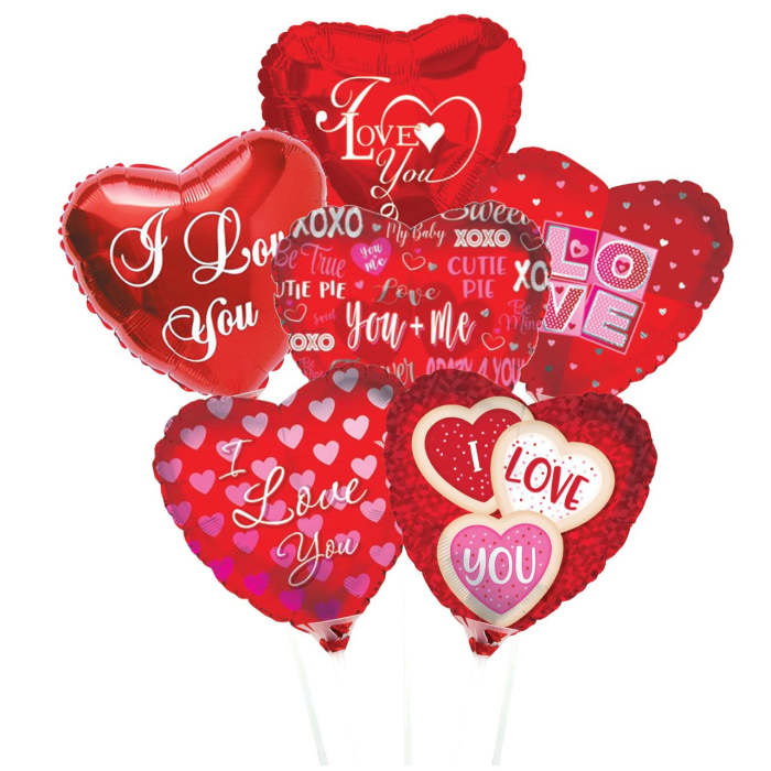 Cluster of red heart-shaped balloons with love messages