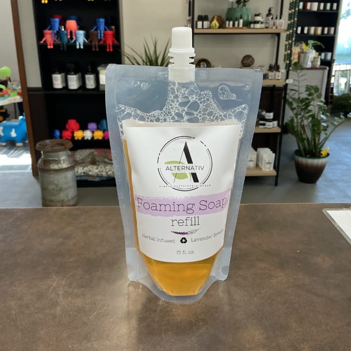 Foaming soap refill pouch on a counter in a shop