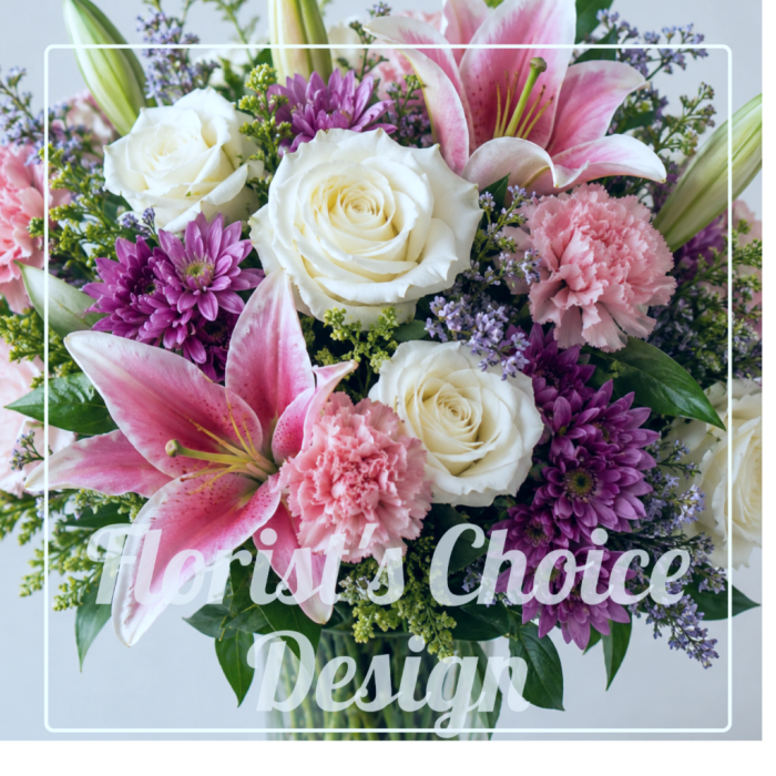 Bouquet of white roses, pink lilies, and purple flowers