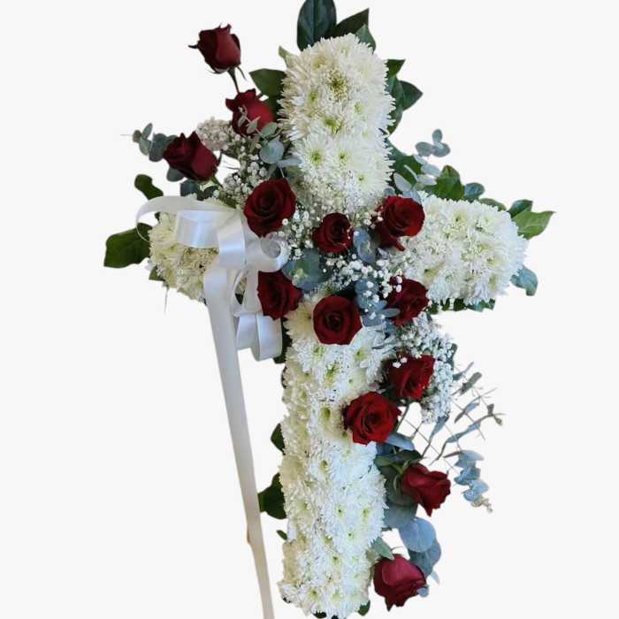 Red roses cross funeral arrangement