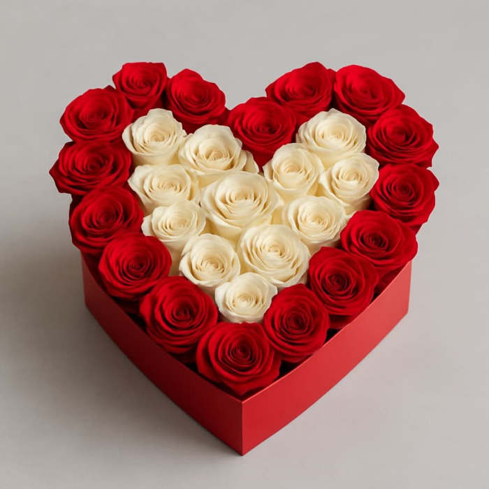 Heart-shaped box of red and white roses