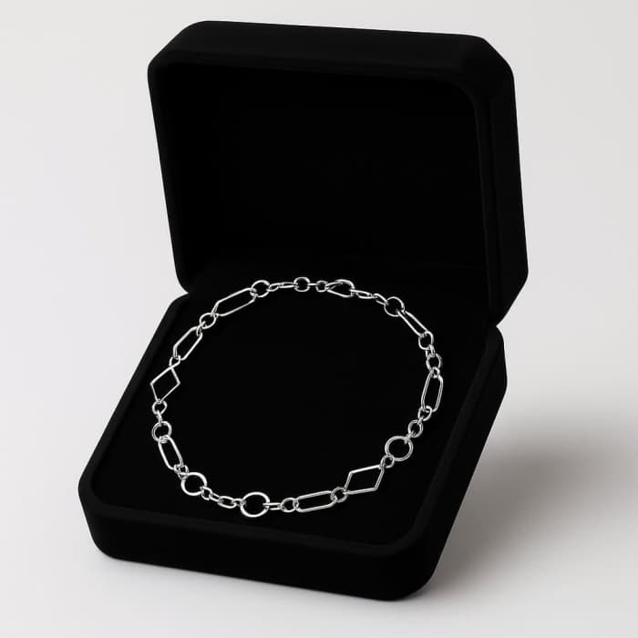 Silver chain bracelet in a black presentation box