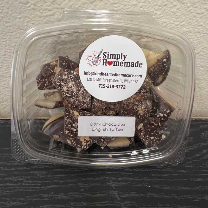 Plastic container of dark chocolate English toffee pieces