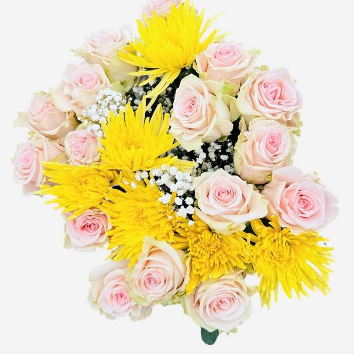 Bouquet of pink roses and yellow chrysanthemums with baby's breath