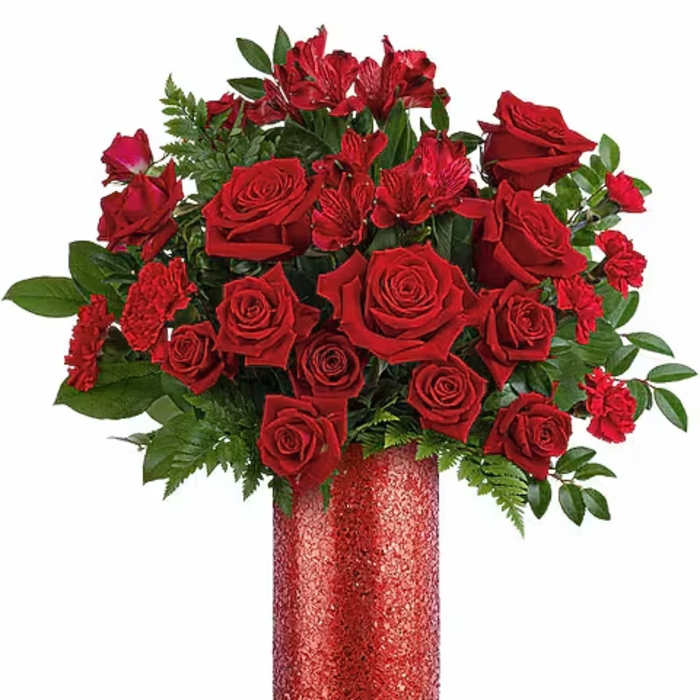 Red roses in a glittery red vase