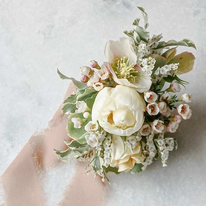 Small ivory floral bouquet with blush ribbon