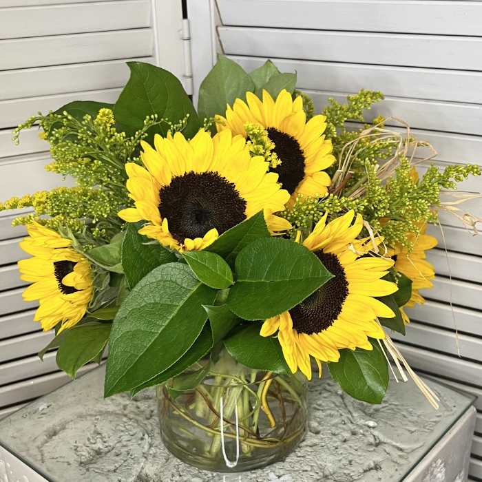 Sunflower bouquet in a clear glass vase