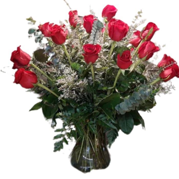 Bouquet of red roses in a glass vase