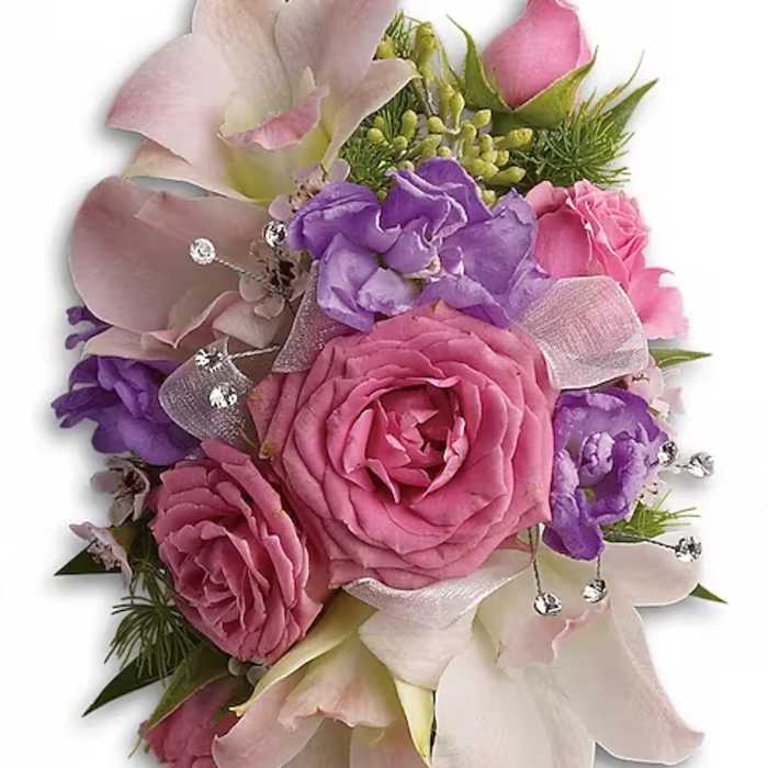 Pink and purple floral bouquet with roses and orchids