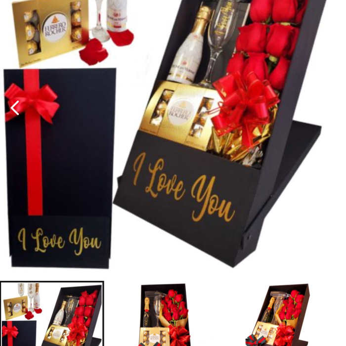 Gift box with red roses, champagne, and chocolates