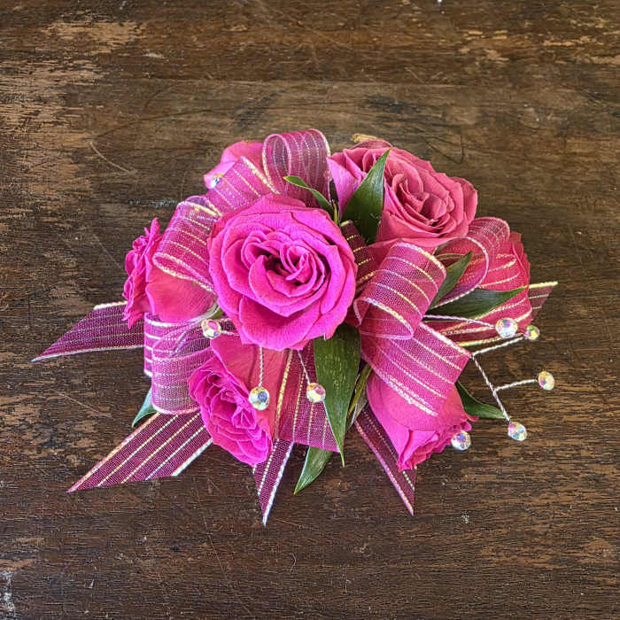 Hot pink rose bouquet with striped ribbon and bead accents