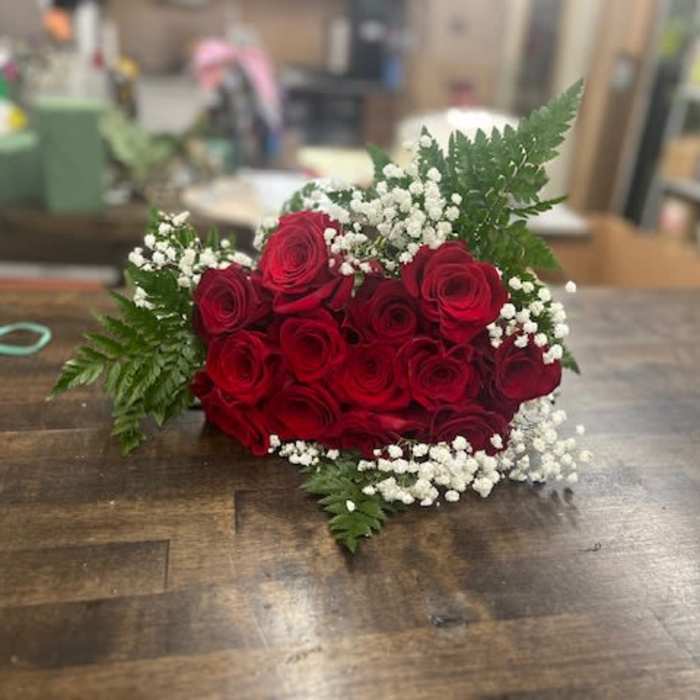 Red rose bouquet with baby's breath and fern greenery