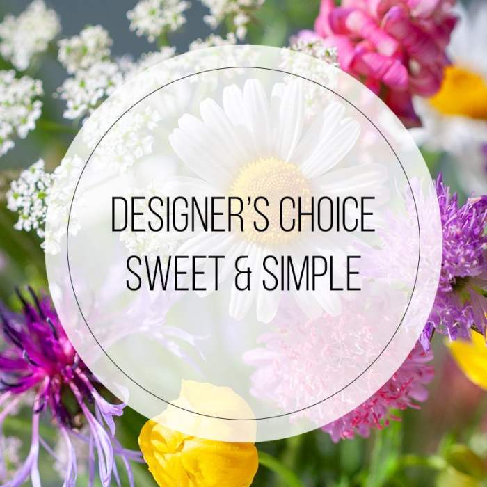 Designer’s choice floral arrangement with white daisy and purple blooms