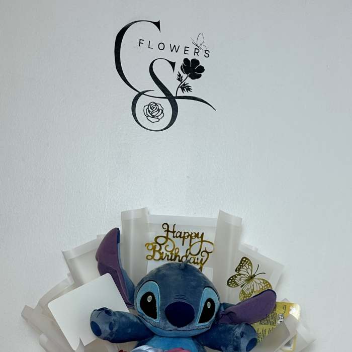 Blue plush toy bouquet with silk roses and birthday topper