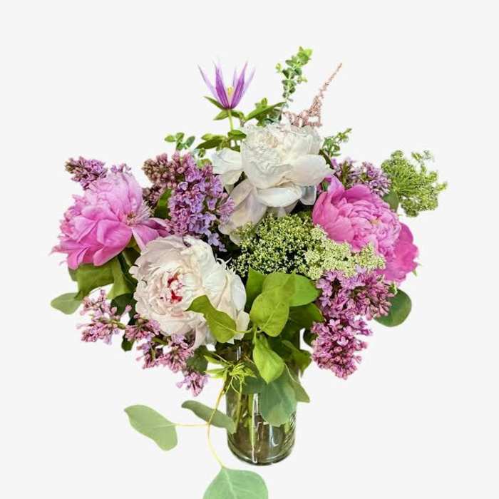Pink and white mixed bouquet in a glass vase