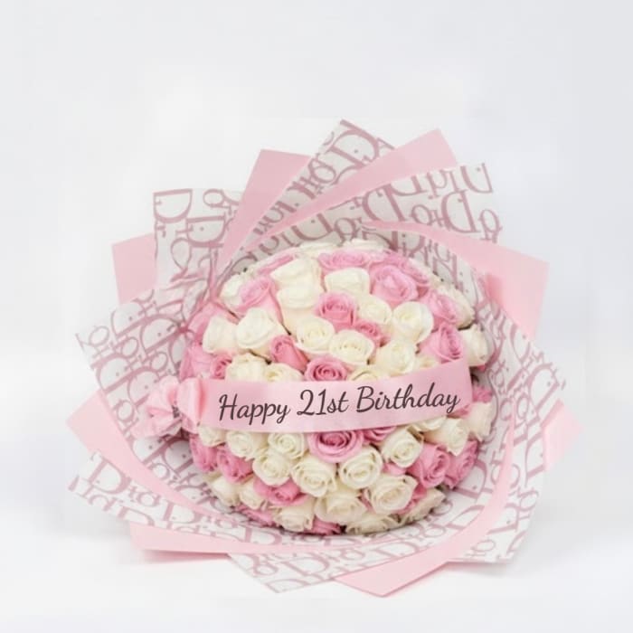 Pink and white rose bouquet with a birthday ribbon