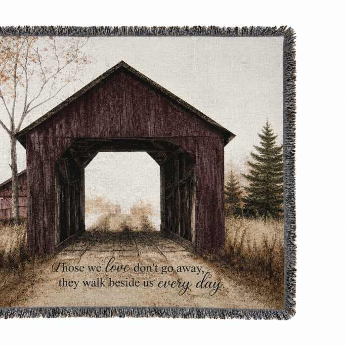 Fringed memorial throw blanket with a covered bridge scene and printed quote