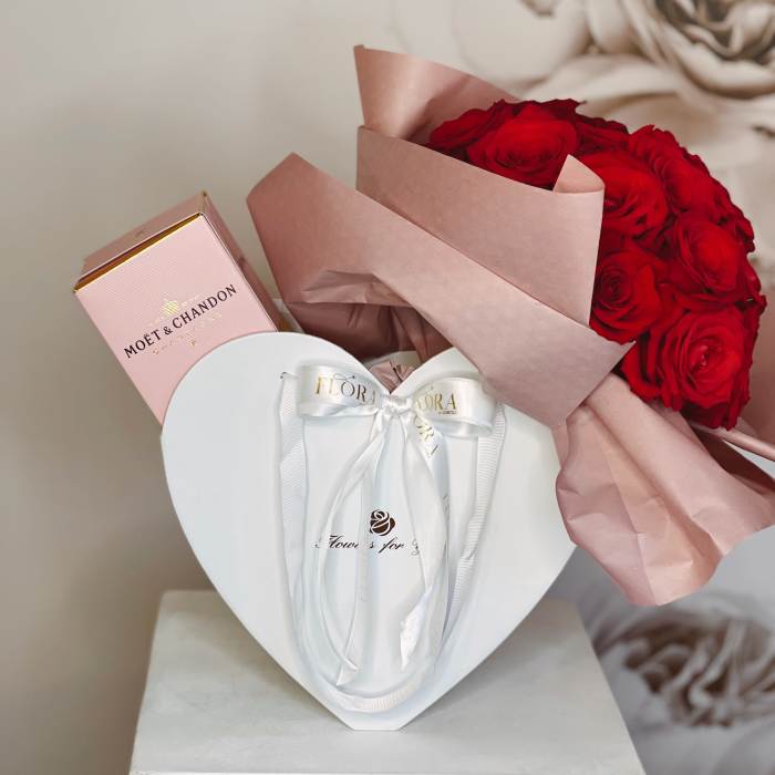 Red rose bouquet with a pink champagne box and white heart gift box