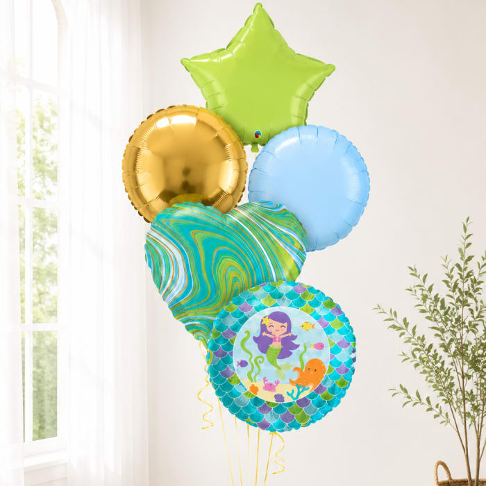 Cluster of colorful helium balloons with a mermaid design and star balloon