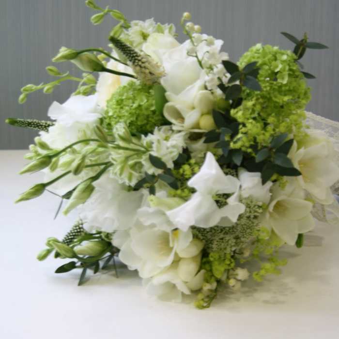 White and green floral bouquet with calla lilies and hydrangeas
