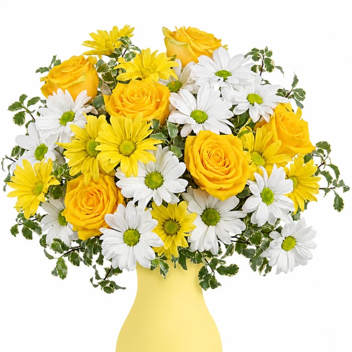 Yellow roses and white daisies in a yellow vase