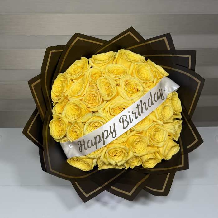 Yellow rose bouquet with a Happy Birthday ribbon