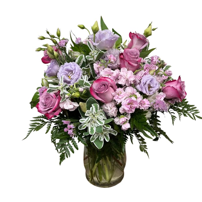 Pink and lavender bouquet in a glass vase