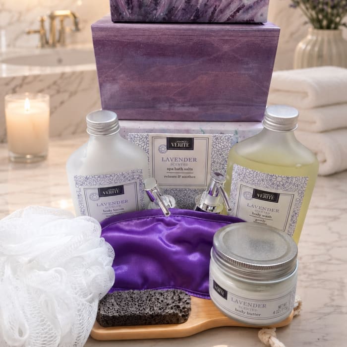 Lavender bath and body gift set with bottles, jars, and a purple pouch