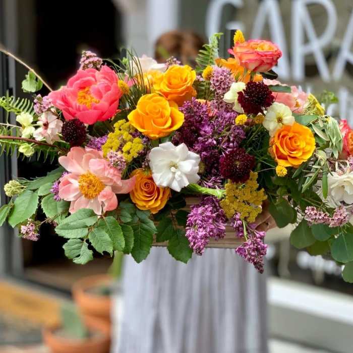 Colorful mixed bouquet with roses and assorted blooms