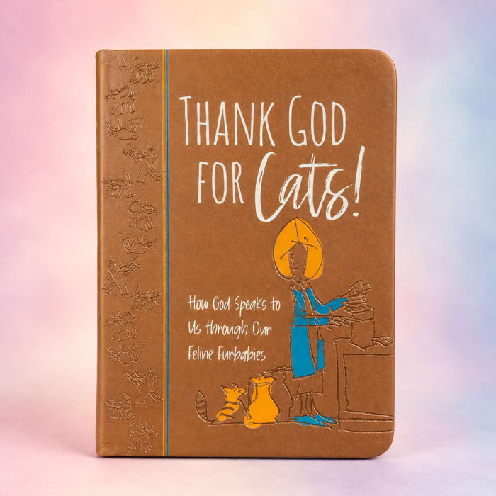 Brown book with the text "Thank God for Cats!" on the cover