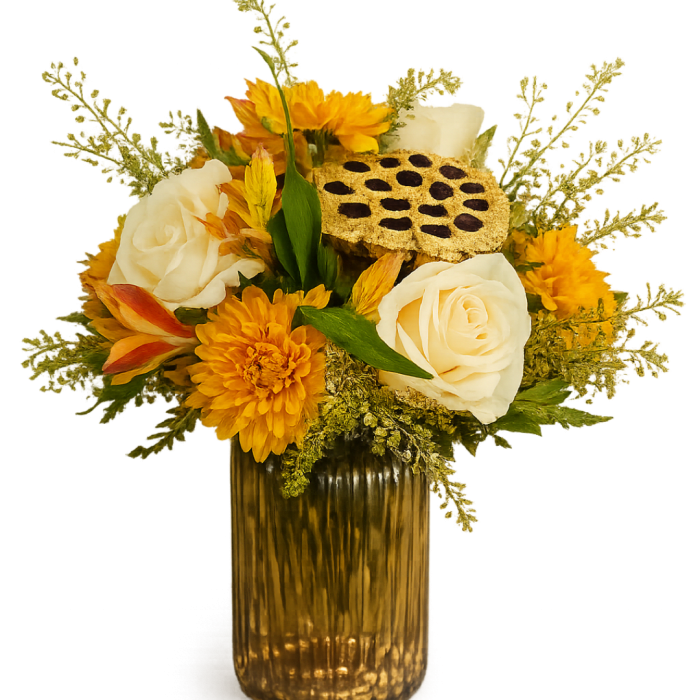 Yellow and white floral arrangement in a ribbed glass vase