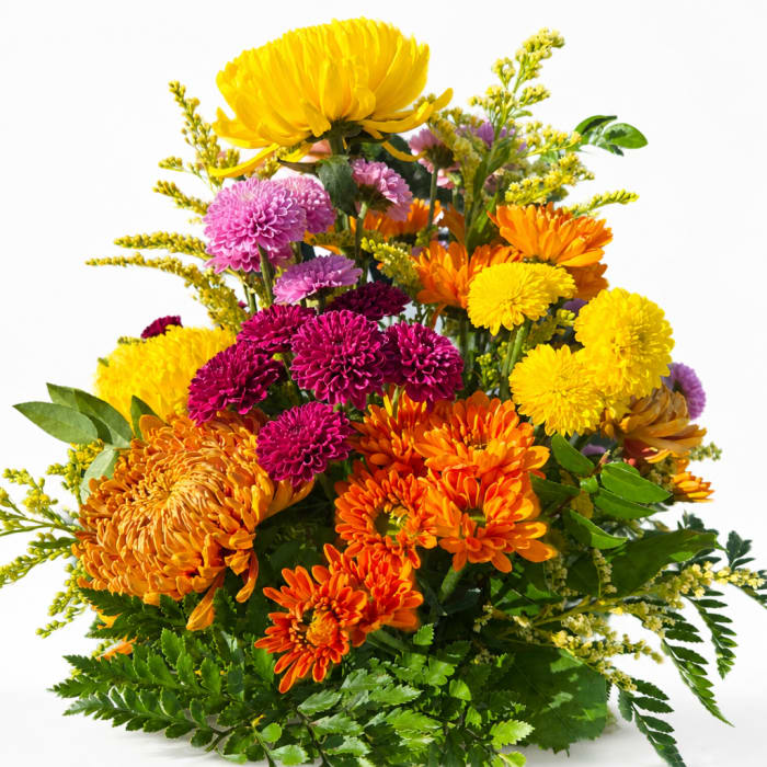 Bright mixed chrysanthemum bouquet in yellow, orange, pink, and purple