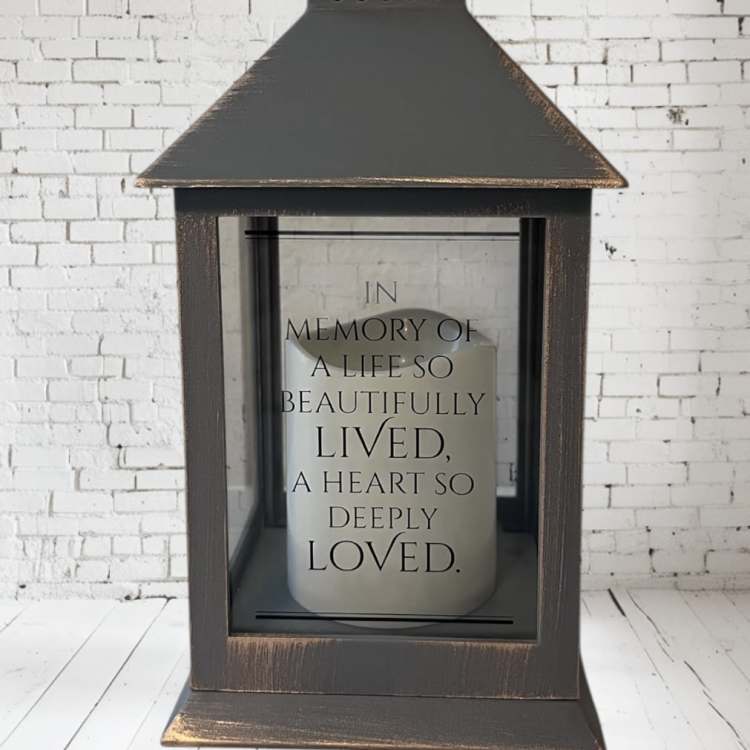Decorative lantern with a memorial candle inside