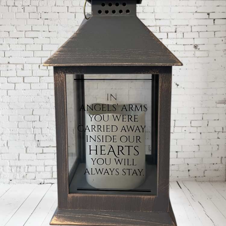 Decorative lantern with a memorial quote inside