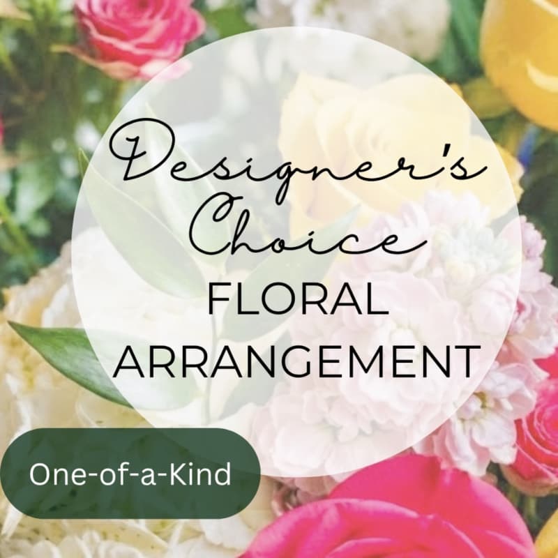 Designer’s choice floral arrangement with pink, white, and yellow blooms