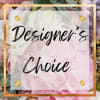 Designer&rsquo;s choice of flowers for arrangement.