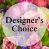 Designer&rsquo;s choice of flowers for arrangement.