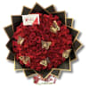 Large bouquet of red roses with gold butterfly decorations