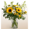 Sunflower and daisy bouquet in a clear glass vase