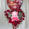 Red rose bouquet with a Valentine balloon and pink teddy bear