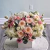 Large pastel bouquet in a white box with roses and hydrangeas