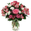 Pink and white mixed bouquet in a clear glass vase