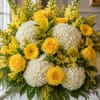 A radiant and cheerful arrangement designed withpremium yellow roses, lush white hydrangeasbright