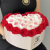 Heart-shaped box of red and white roses with pink centers