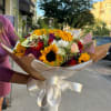 Golden Glow is a vibrant and warm bouquet that combines the majesty