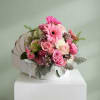 Pink and white mixed bouquet in a white hat box with a ribbon