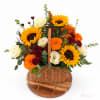 Basket arrangement with sunflowers, white roses, and orange marigolds