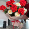 This bouquet is a stunning mix of French red and soft ivory